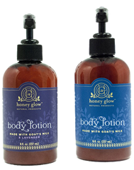 Two bottles of Honey Glow body lotion, one with a lavender scent and the other unscented. Both bottles are amber-colored and have a black pump dispenser.
